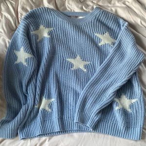 blue sweater with white stars